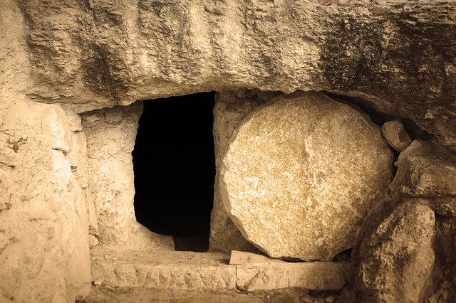 Empty tomb with shining light